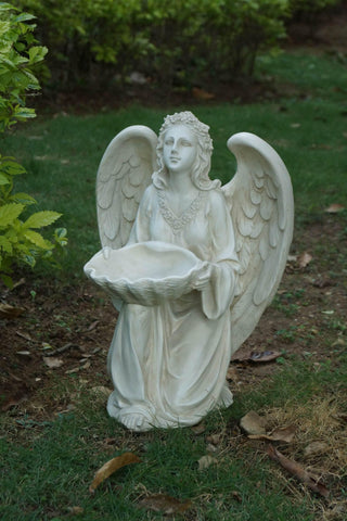 Angel Kneeling and holding Shell - Ivory