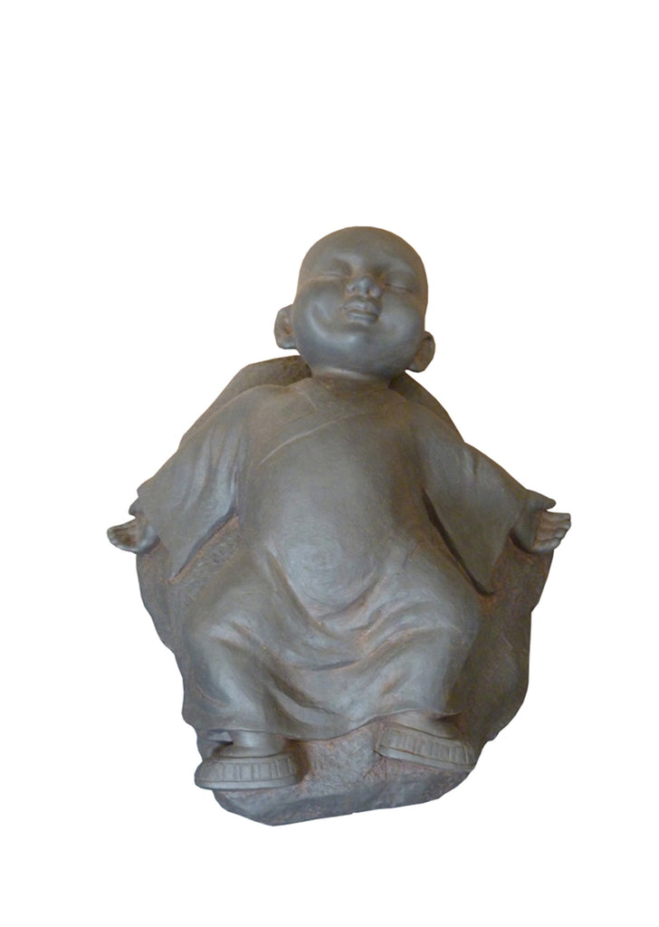 Buddha Child Statue on a Rock
