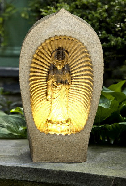 Buddha in Grotto Fountain With Light