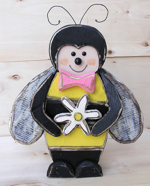 Wooden Bee Holding Flower