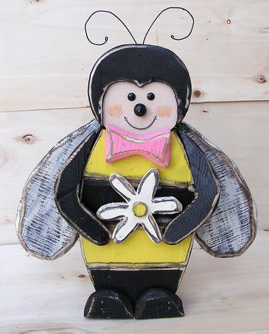 Wooden Bee Holding Flower