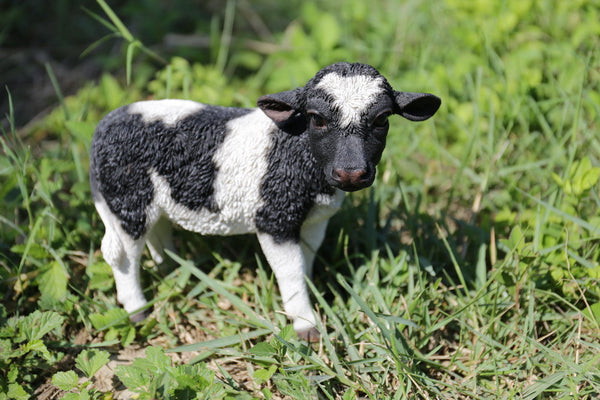 Black and White Standing Cow Statue